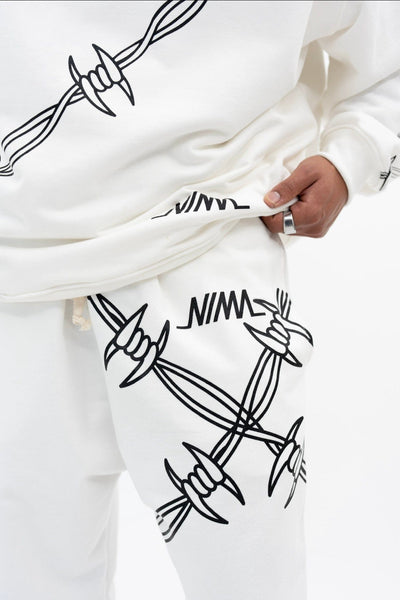 NIMA BARB WIRE WHITE SWEATPANTS - NIMA Sports Audio